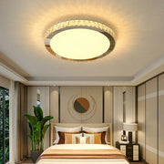 Elegant crystal round ceiling lamp with warm glow, frosted glass panel, and decorbites crystal round embellishments for living room