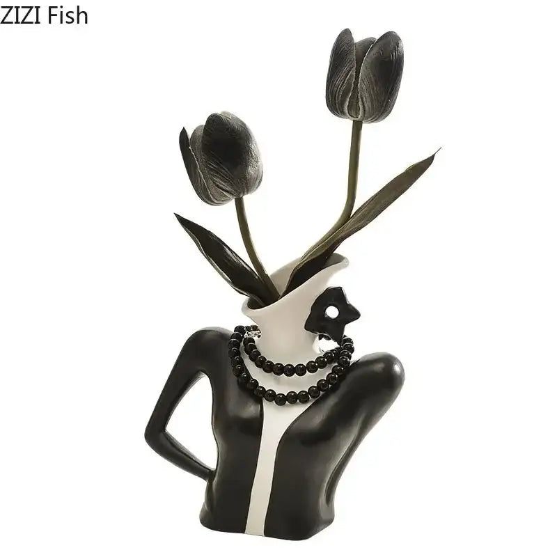 Elegant dames ceramic black and white ceramic vase figure of a woman bust with pearl necklace holding three black tulips
