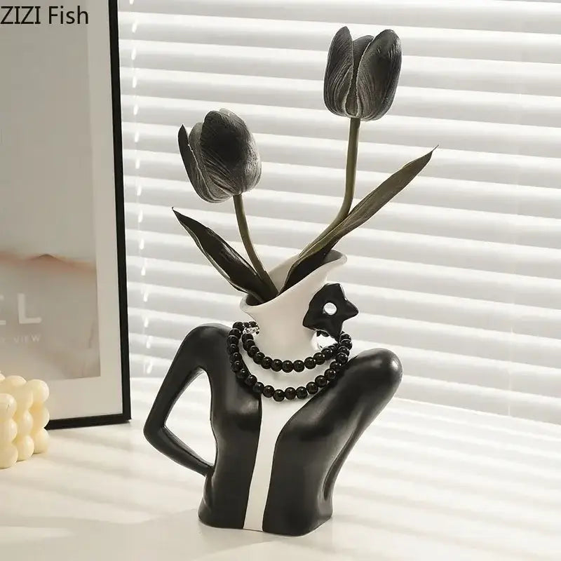 Elegant dames ceramic black and white ceramic vase figure shaped like a woman bust holding dark tulips for bedroom decor