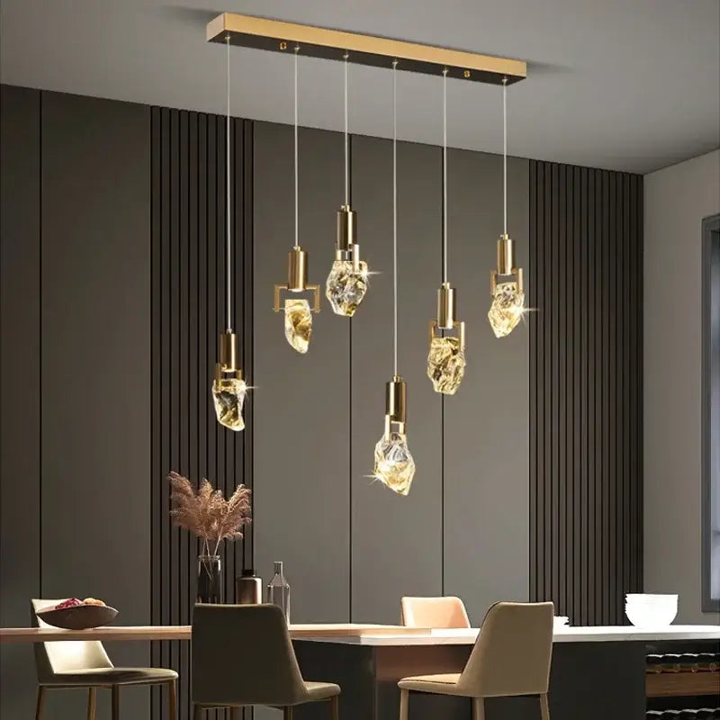 Modern gold-toned decorbites elegant diamond crystal chandelier pendant light with faceted crystal shades for dining room decor