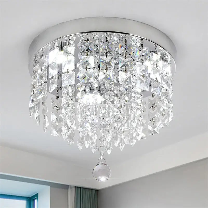 Elegant diamond crystal led ceiling chandelier with chrome base and cascading clear faceted crystals for living room