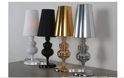 Four elegant european style bedside lamps in white black gold and silver with sleek tiered bases for bedroom decorbites elegant european