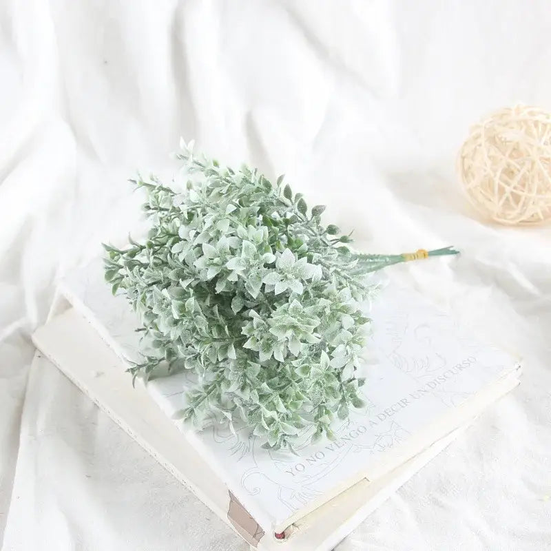 A delicate frost-dusted purple silk flocking lover grass bouquet with soft leafy branches for elegant flocking decorbites
