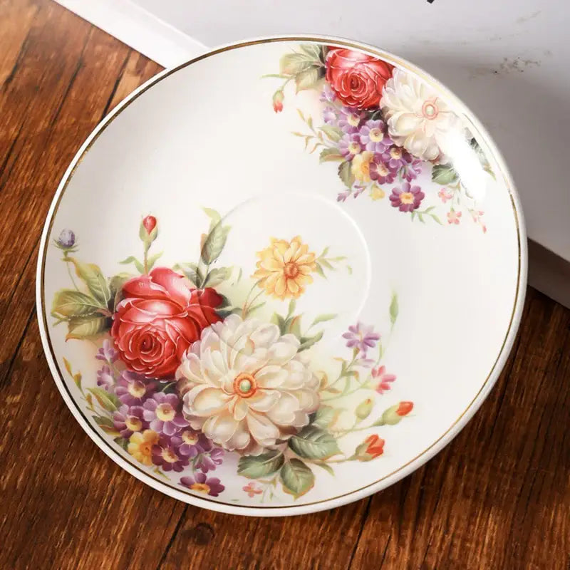 Elegant floral ceramic white saucer with red roses cream dahlias purple blossoms and gold trim decorbites elegant floral cup