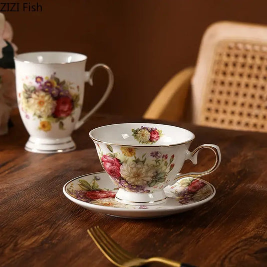 Elegant floral ceramic white porcelain cup and saucer set with vibrant floral patterns and gold-trimmed rims by decorbites