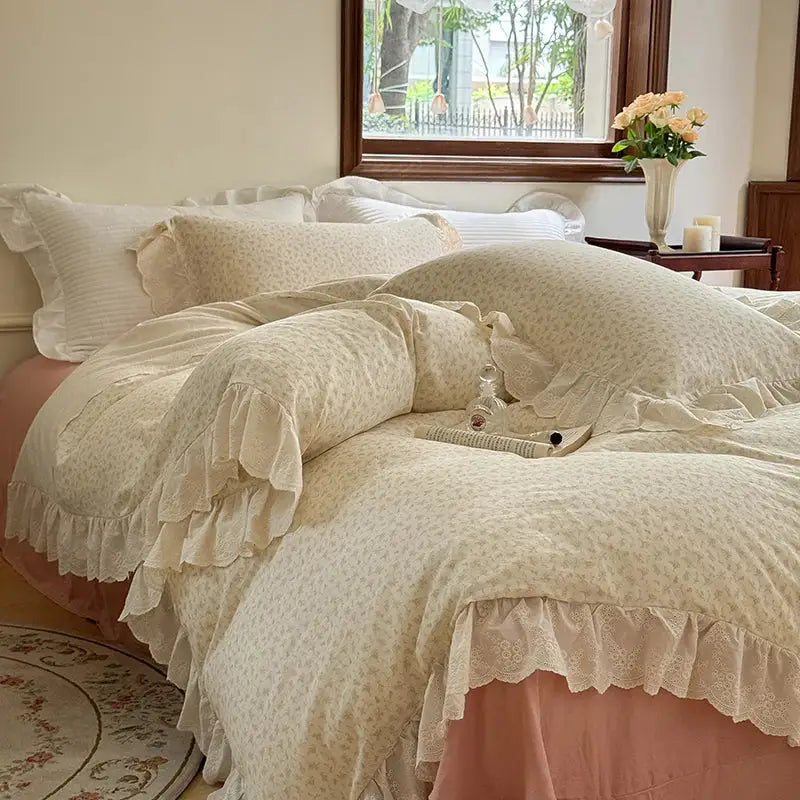Cream-colored bedding set featuring elegant floral lace and delicate floral lace ruffles with layered trims