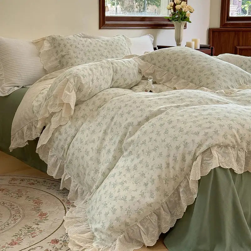 Cream-colored bedding set with elegant floral lace ruffles and soft textured fabric for a refined bedroom look