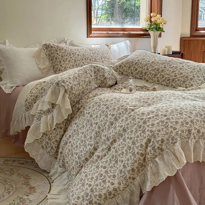 Elegant floral lace cream bedding set featuring delicate floral lace ruffles with a soft vintage design