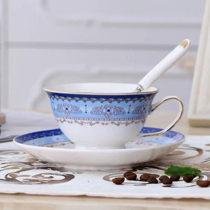 Elegant blue and white porcelain tea cup set with gold trim and intricate floral patterns for dining room use