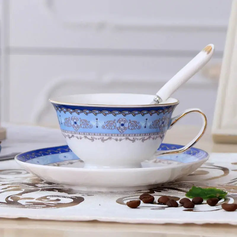 Elegant blue and white porcelain tea cup set with gold trim and intricate floral patterns for dining room use