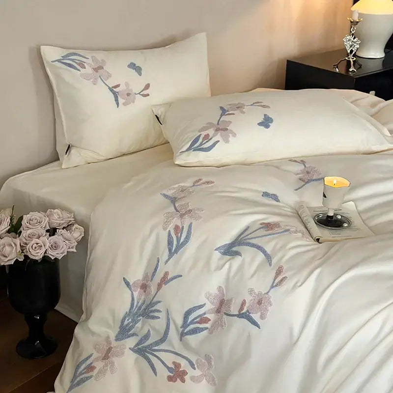Cream satin bedding set with elegant flower embroidery in pink and blue for refined decorbites elegant flower decor