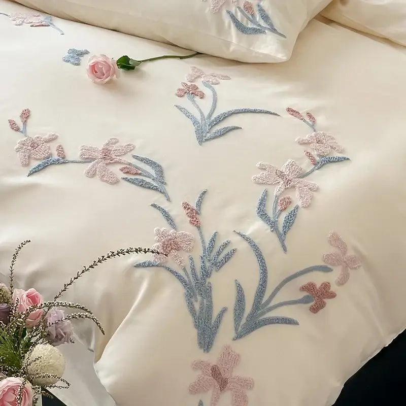Cream satin bedding set with elegant flower embroidery in pink and blue for decorbites elegant flower decor