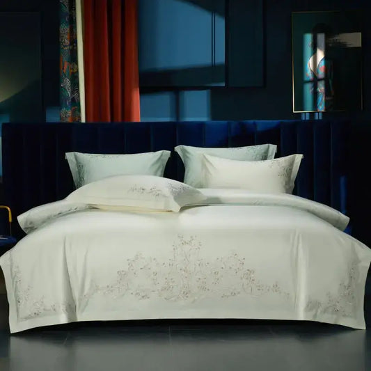 Cream-colored satin bedding set with elegant flowers embroidery in soft silver thread from decorbites elegant flowers