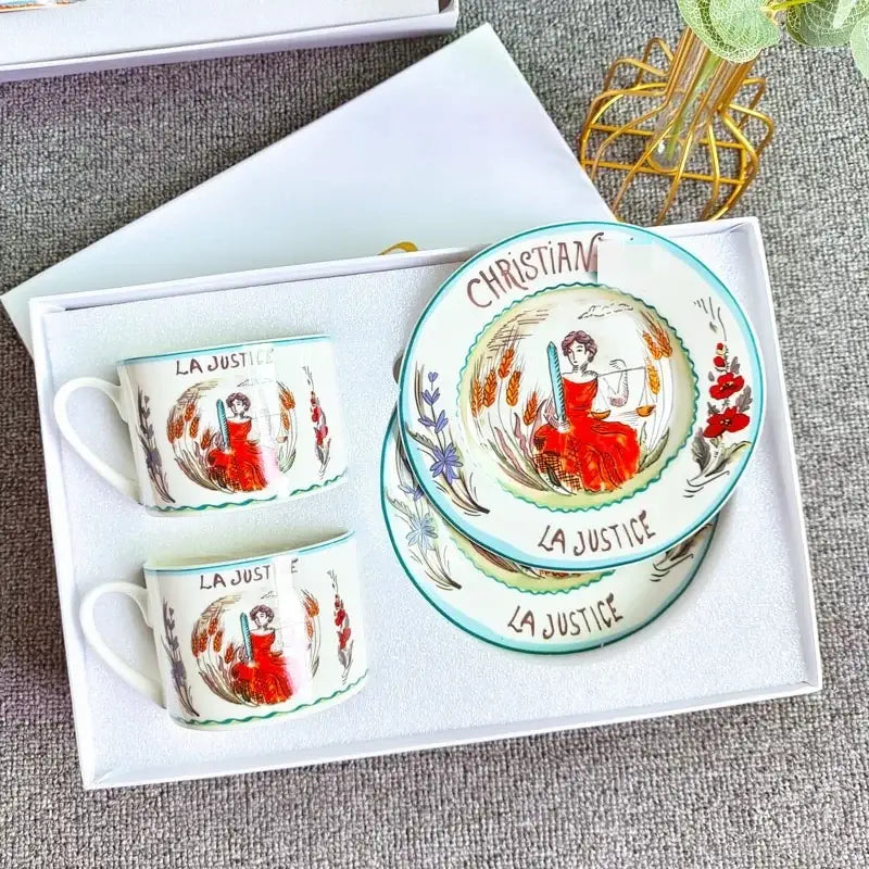 Elegant white bone china tea cup set with hand-painted woman in red robes holding scales la justice design