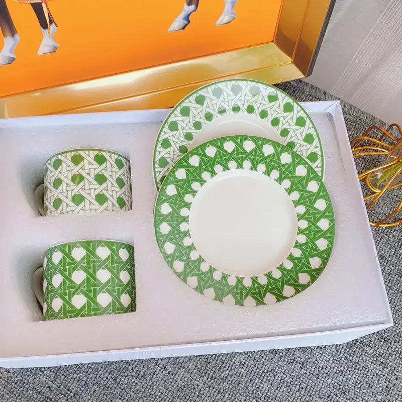 Elegant geometric bone china tea cup set featuring green and white patterned ceramic dinnerware with lattice design