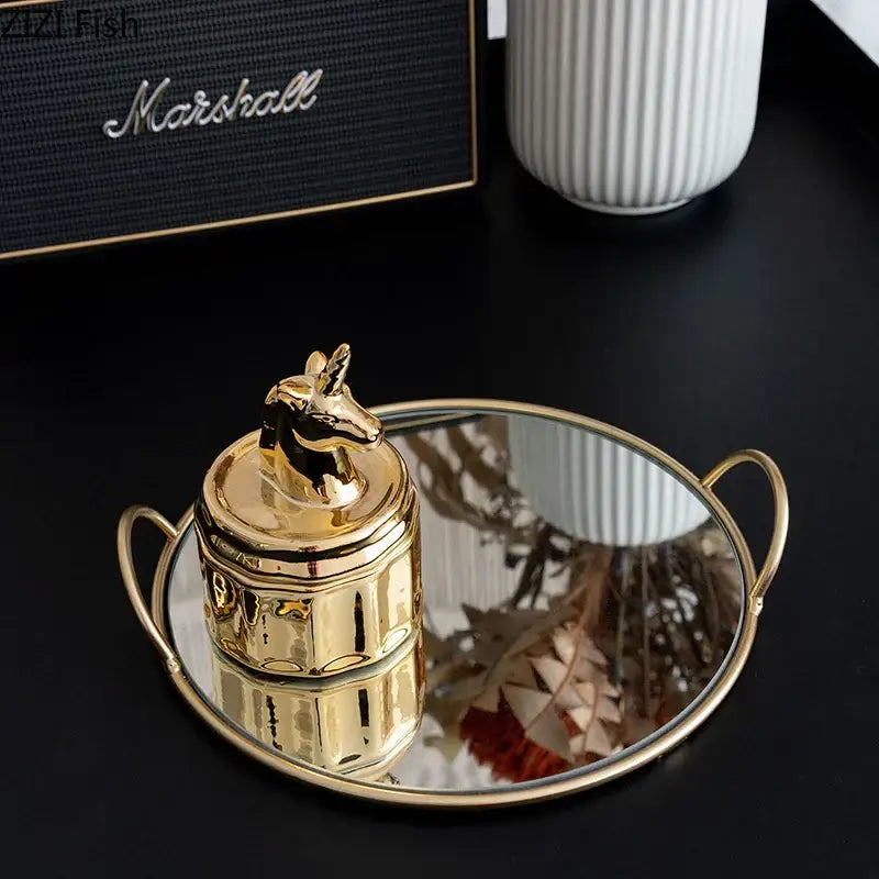 Elegant gold unicorn-themed ceramic jar with brass handle decorbites brass handle storage tray for dining room use