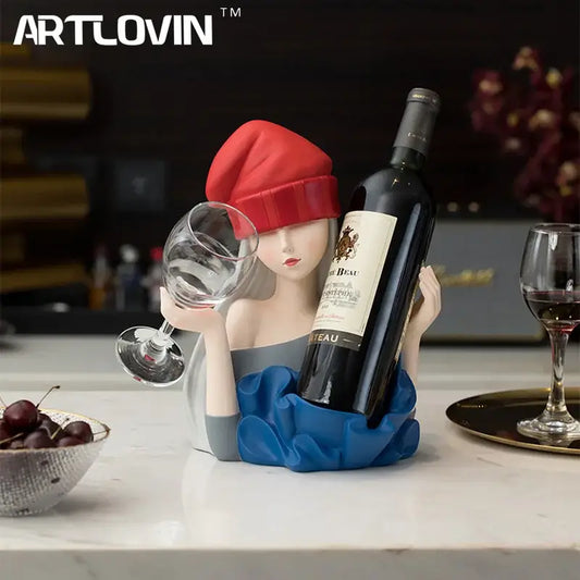 Artlovin ceramic elegant girl sculpture wine rack in red beanie and blue dress holding wine bottle and glass for decorbites