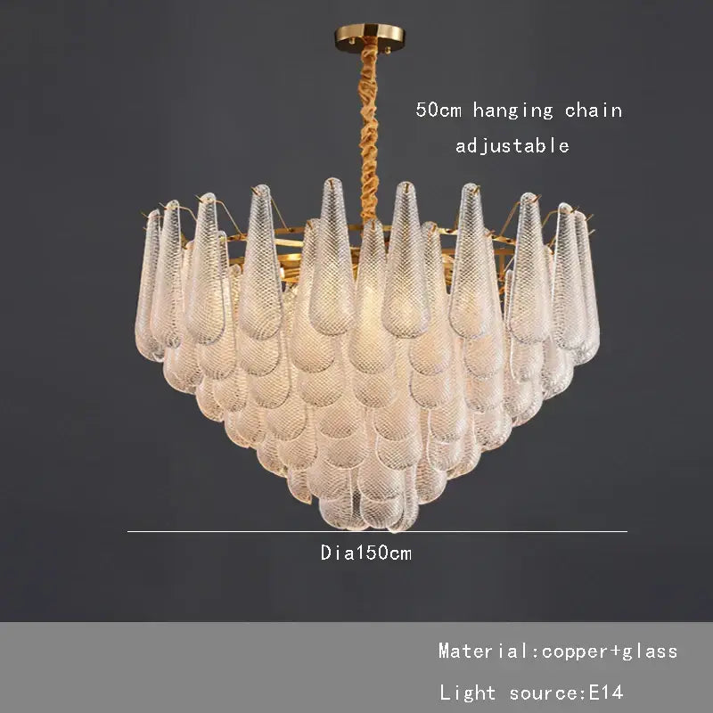 Elegant glass chandelier lighting with cascading clear glass teardrop shades and brass finished copper frame for dining room