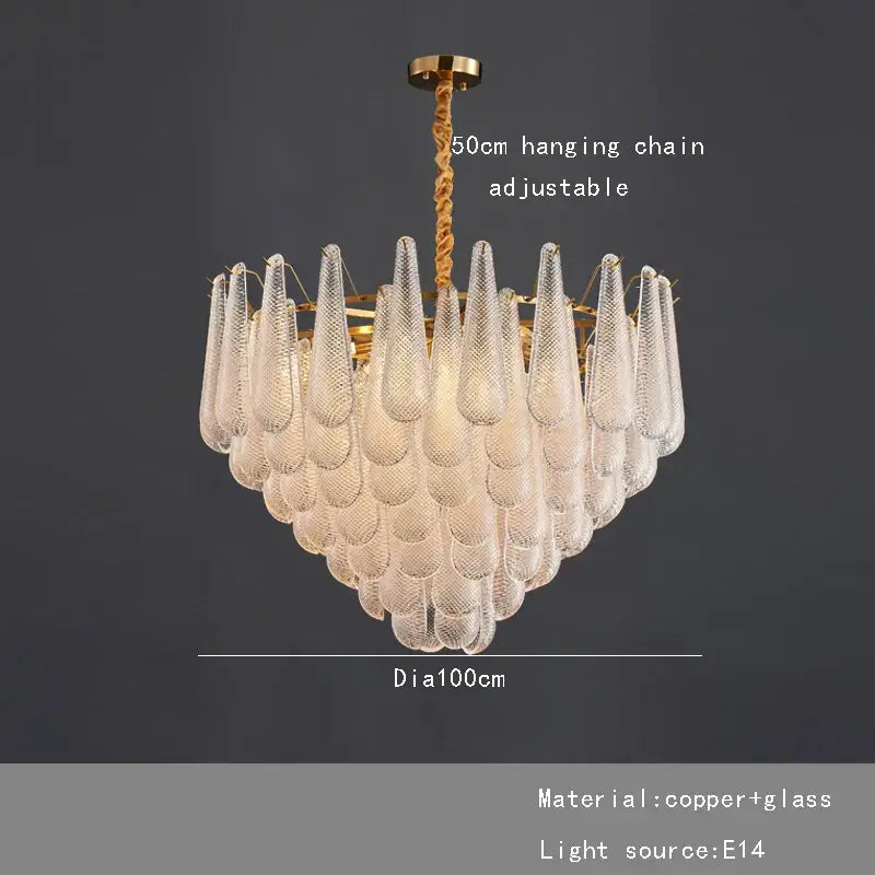 Elegant glass chandelier lighting with tiered clear textured teardrop shades and brass-finished copper frame for dining room