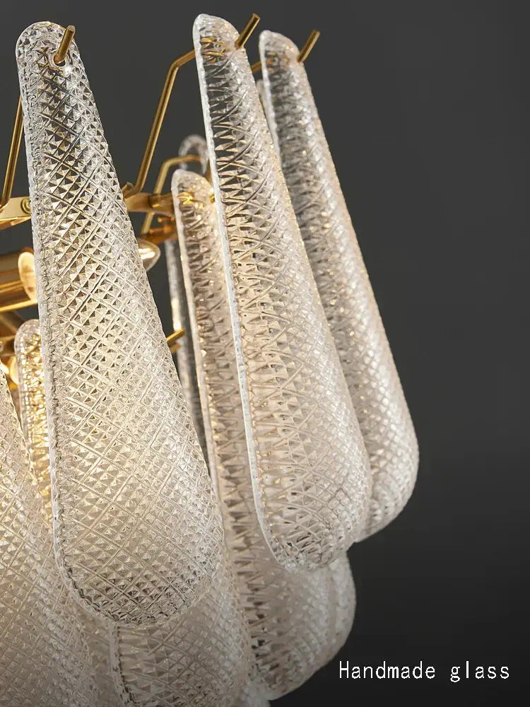 Elegant glass chandelier lighting with clear diamond-cut glass and gold-toned metal frame for dining room decorbites elegant glass