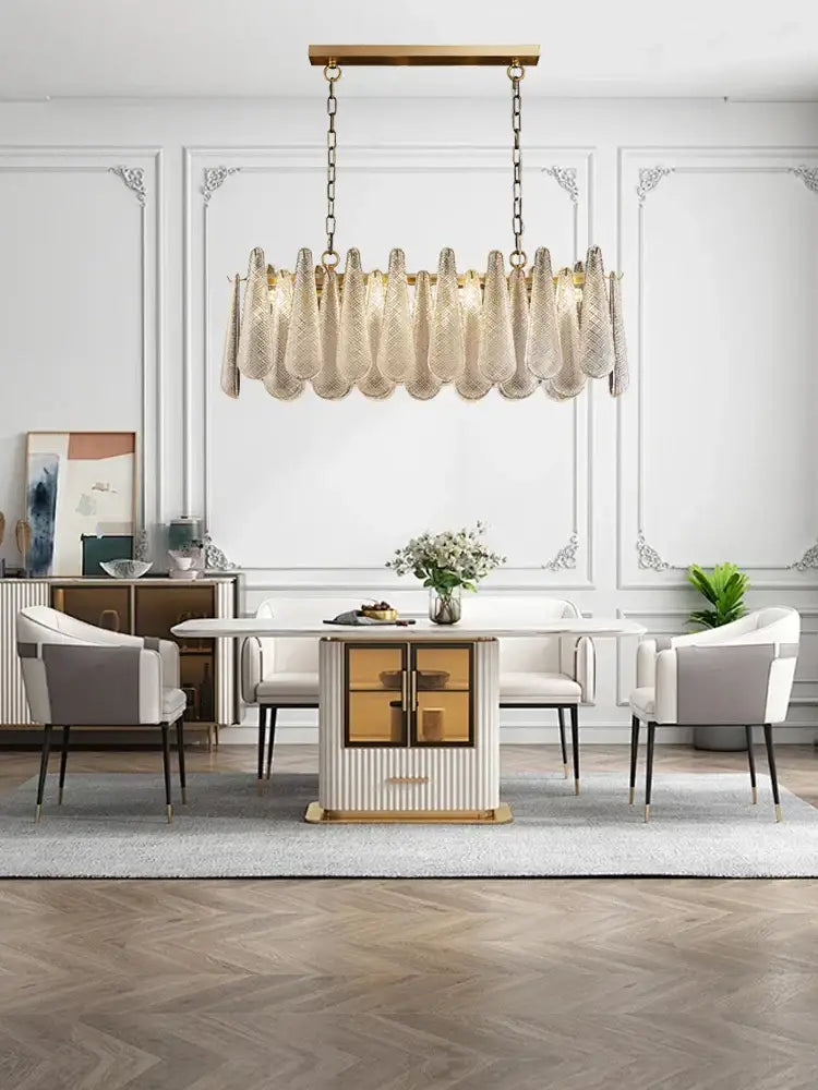Beige textured glass chandelier lighting with gold tiered teardrop frame and chains for elegant dining room decorbites elegant glass