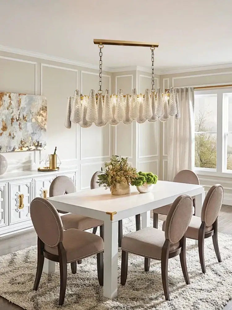 A decorbites elegant glass chandelier with gold tiered teardrop clear glass shades for dining room lighting