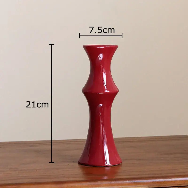 Elegant glossy red bamboo ceramic vase with slender fluted design and tapered base for decorbites bamboo ceramic decor