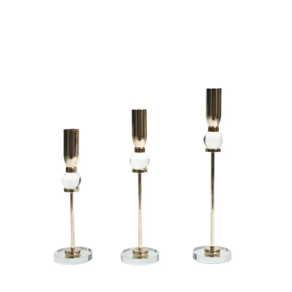 Set of three elegant gold-toned candlestick holders with decorbites crystal glass spheres for dining room decor