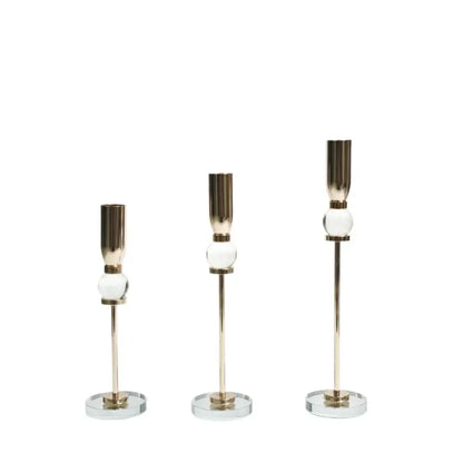Set of three elegant gold-toned candlestick holders with decorbites crystal glass spheres for dining room decor