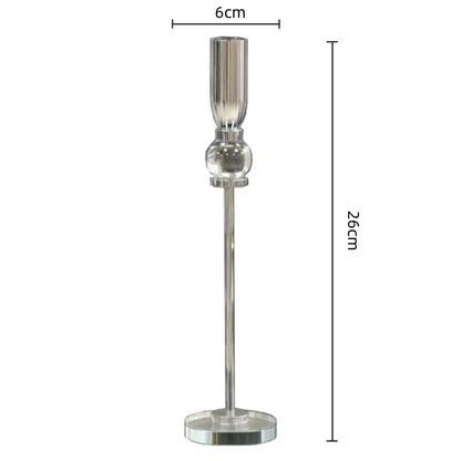 A sleek 26cm tall silver crystal glass candlestick holder with a cylindrical top and clear glass sphere decorbites design