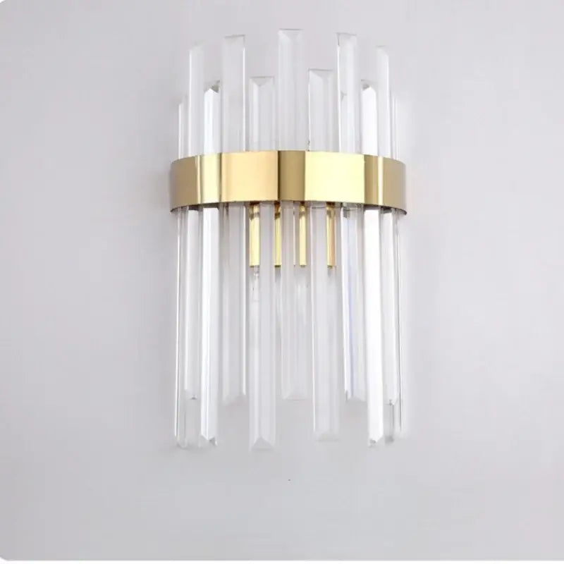 Elegant gold and crystal led wall lamps featuring clear crystal rods and a polished gold band for living room decor