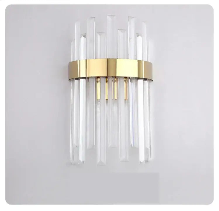 Elegant gold and crystal led wall lamp with clear crystal rods and polished metal band for living room decor