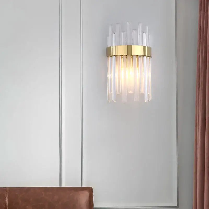 Elegant gold-toned led wall lamps with clear glass rods radiating from a circular base for living space decor