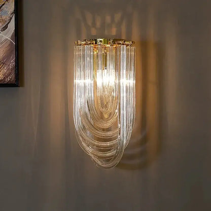 Elegant gold and glass crystal pendant lights with cascading clear glass tubes for modern kitchen island lighting
