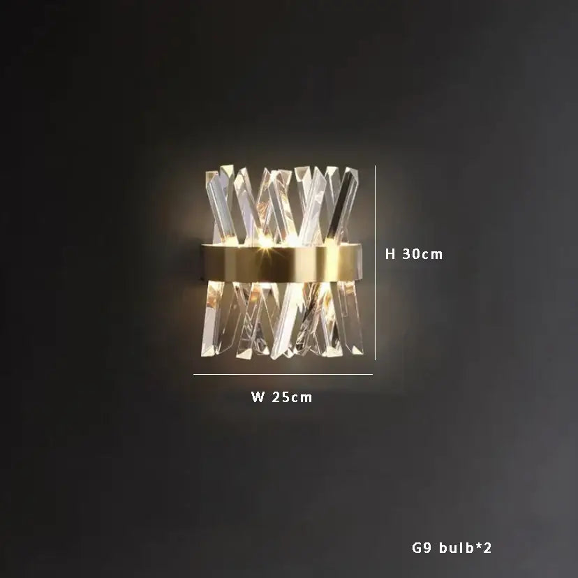 Modern crystal pendant lights with gold-toned metal base and clear faceted glass for elegant kitchen island lighting