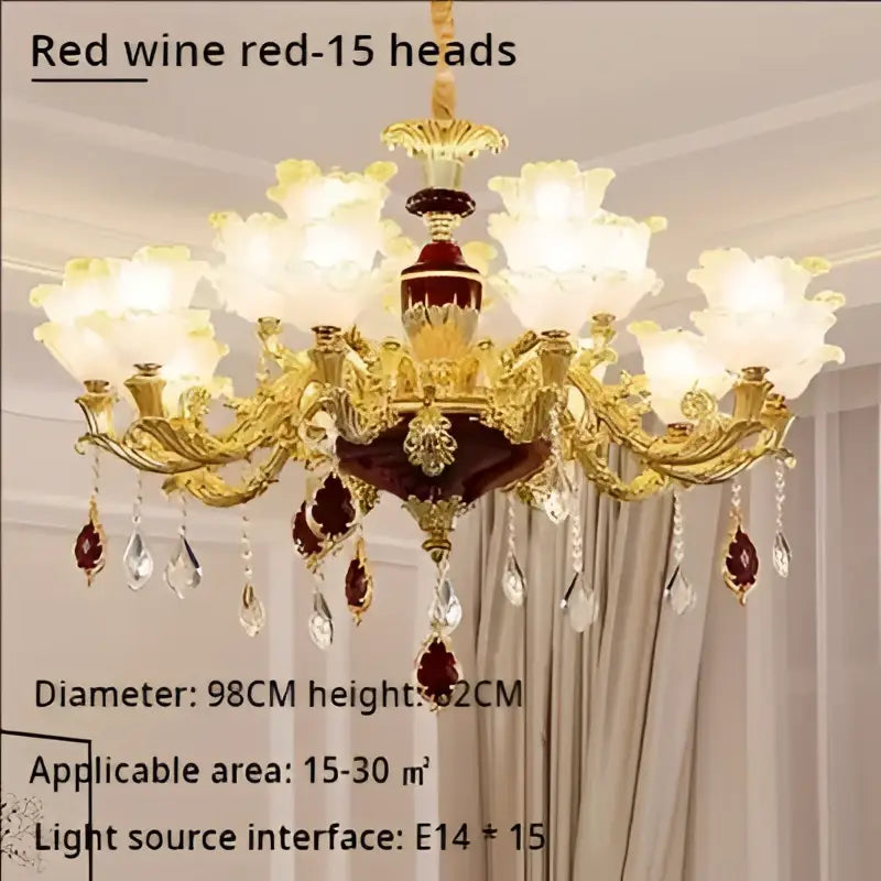 Elegant crystal chandelier by decorbites featuring gold and deep red ornate design with crystal droplets for living room decor