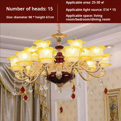 Elegant crystal chandelier by decorbites featuring gold tones, yellow glass flower shades, red gemstones, and crystal droplets