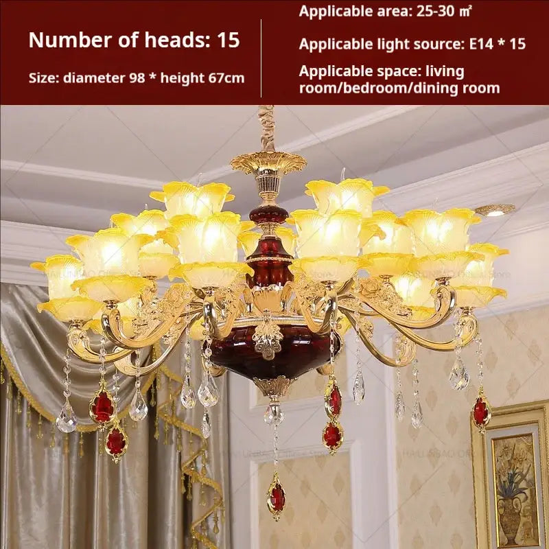 Elegant crystal chandelier by decorbites featuring gold tones, yellow glass flower shades, red gemstones, and crystal droplets