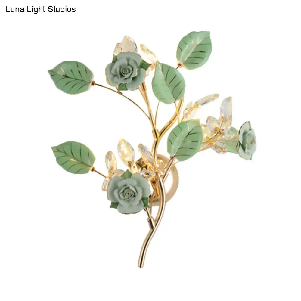 Elegant gold branch wall lamp with direct wired electric design featuring green ceramic roses and crystal blossoms for bedroom