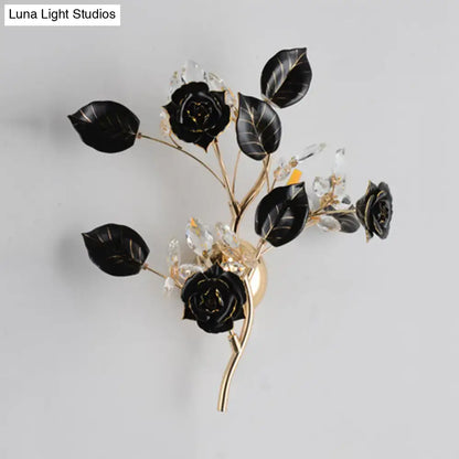 Elegant black rose wall lamp with gold-toned metal branch and clear crystal accents direct wired electric sconce lighting