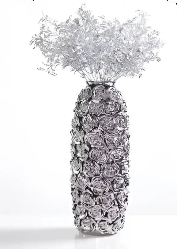 Silver metallic vase with textured raised rose patterns filled with silver-toned dried foliage for elegant gold ceramic rose decorbites centerpiece