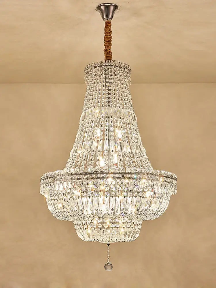 Elegant gold and chrome k9 crystal chandelier with braided rope suspension for dining room decorbites gold chrome design