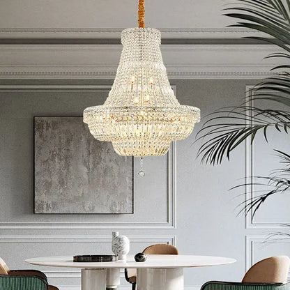Elegant gold and chrome k9 crystal chandelier with cascading clear crystals and warm lighting for dining room decorbites chrome k9 crystal