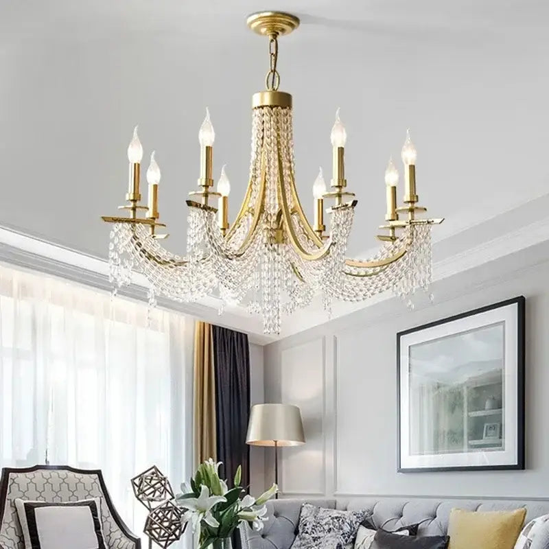 Elegant gold crystal candle chandelier with crystal droplets and candle-style bulbs for dining room decorbites crystal candle