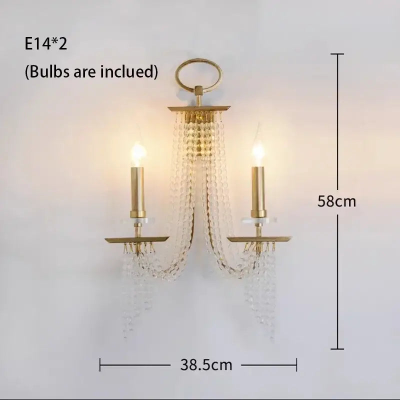 Elegant gold crystal candle chandelier featuring a gold-toned wall sconce with two candle-style bulbs and cascading beads decorbites crystal candle