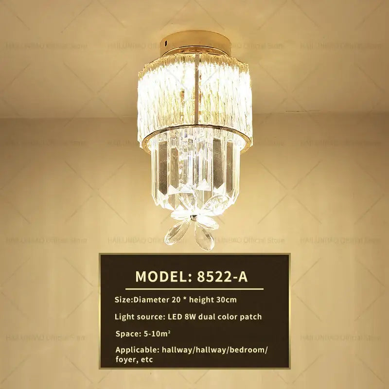 A decorbites elegant crystal ceiling light with gold-toned metal frame and cascading clear glass prisms for hallway decor