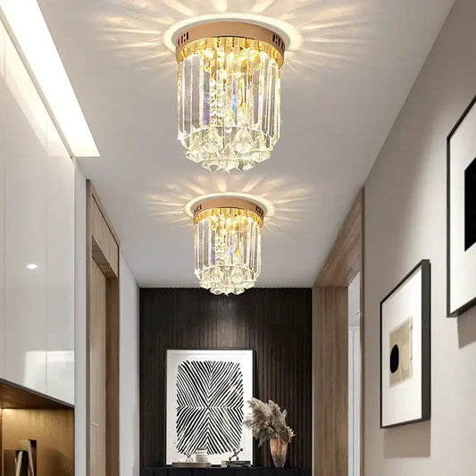 Two elegant gold crystal ceiling lights with cascading clear glass prisms for hallway decorbites elegant crystal design