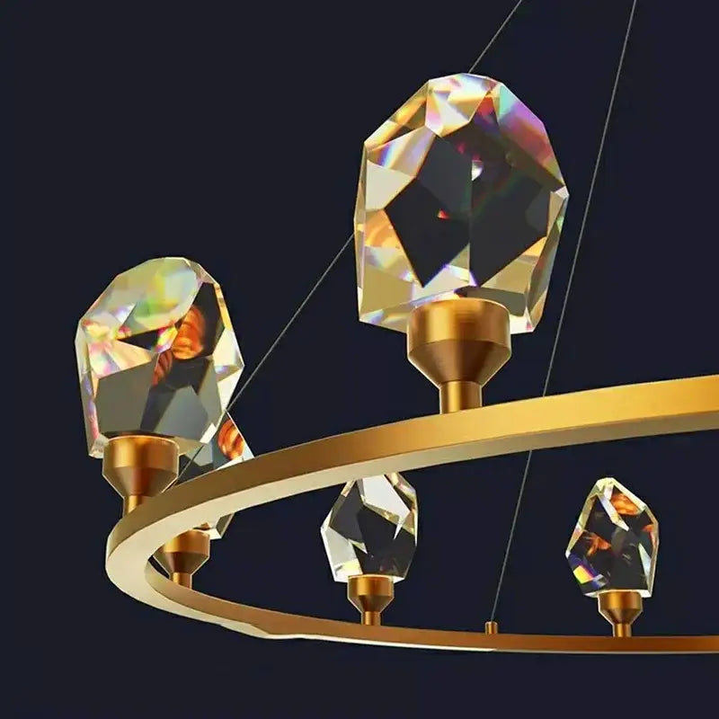 Elegant chandelier dining pendant light with gold-toned frame and four faceted crystal pendants by decorbites pendant lights