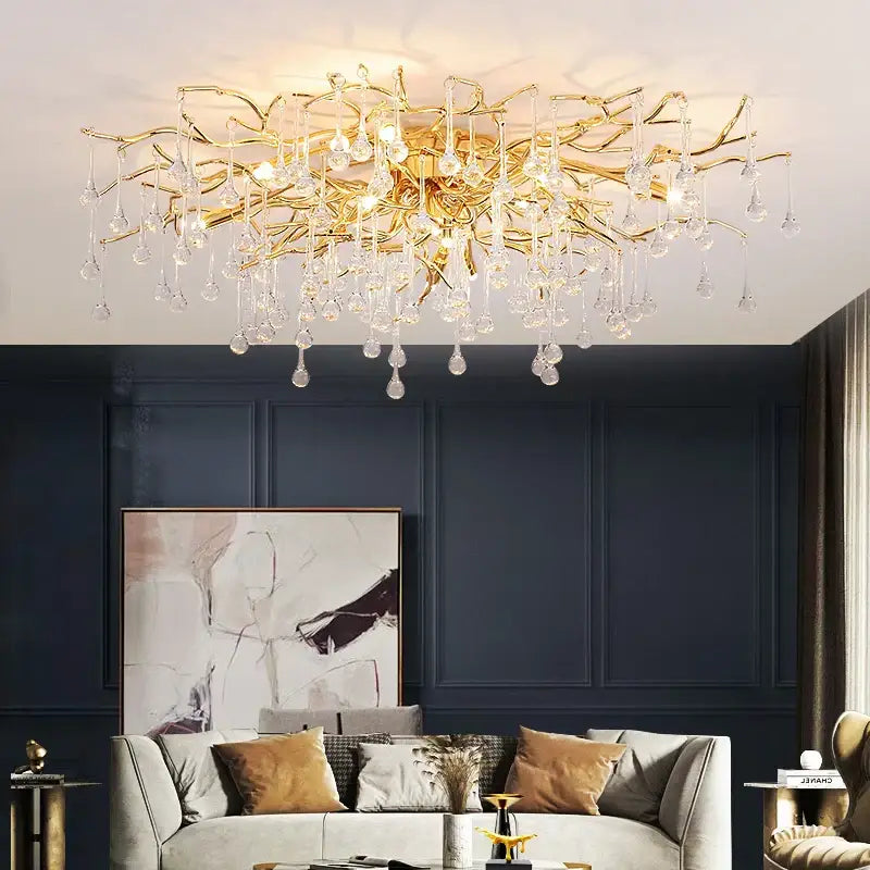 Elegant gold crystal chandelier with intricate branching arms and dangling crystal droplets for living room decorbites elegant gold