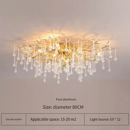 Elegant gold crystal chandelier with branching tree design and clear crystal droplets perfect for living room decorbites elegant gold